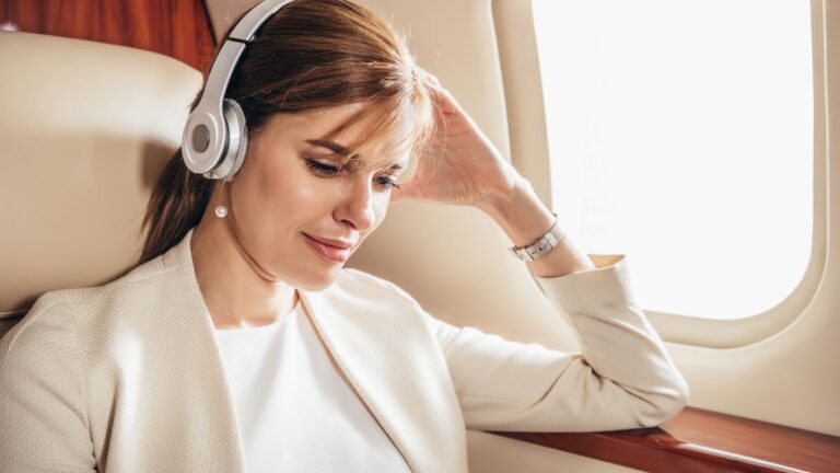 How to Listen to Music on a Plane? Exploring the Best Apps & Devices