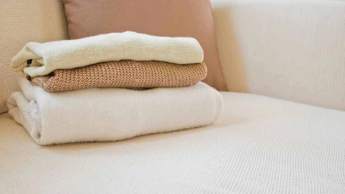 8 Genius Packing Hacks for Bulky Sweaters