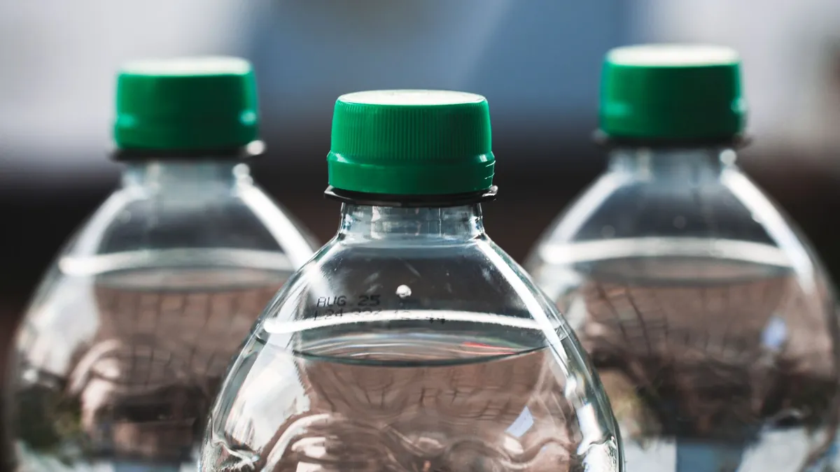 Bring empty water bottles to fill after security to stay hydrated throughout the airport and flight without purchasing overpriced beverages