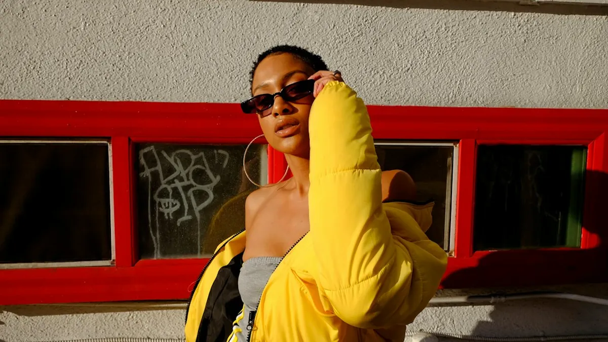 Carry Your Bulkiest Outerwear Over Your Arm Rather Than Packing It Inside