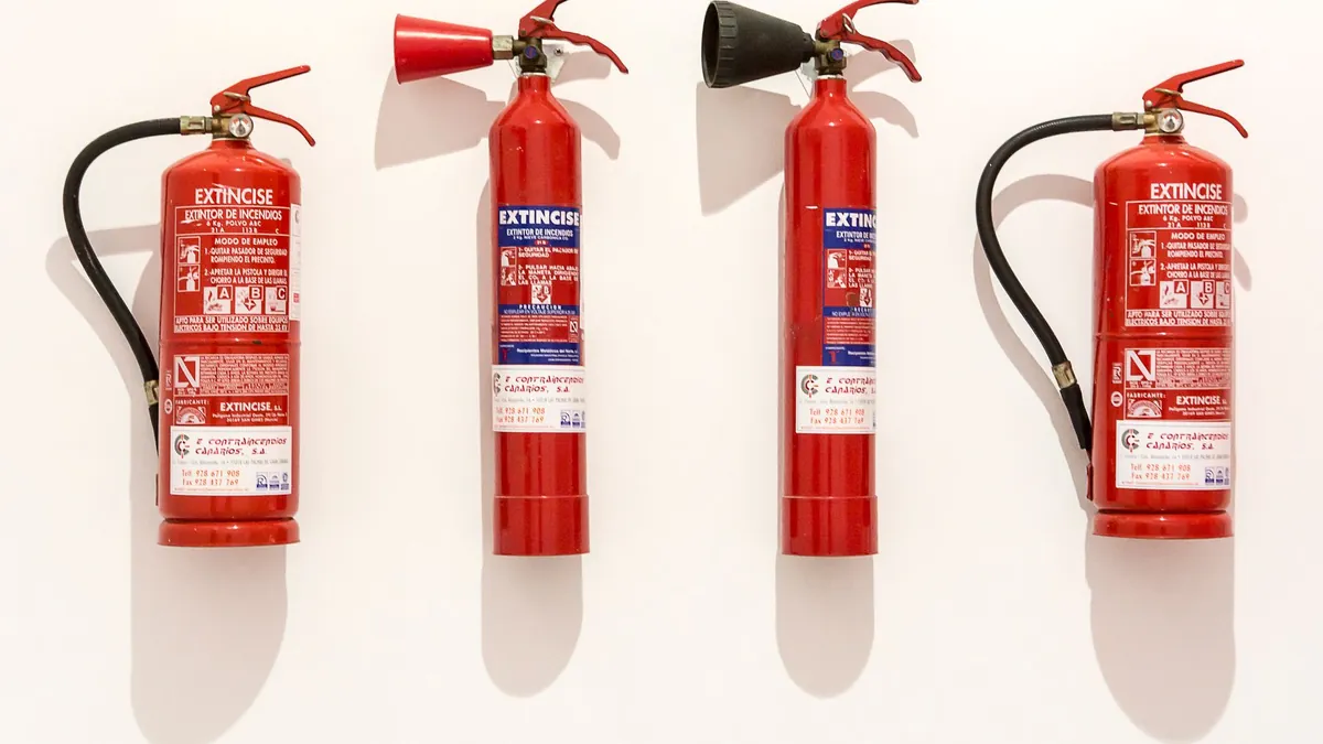 Compact fire extinguisher rated for vehicle fires
