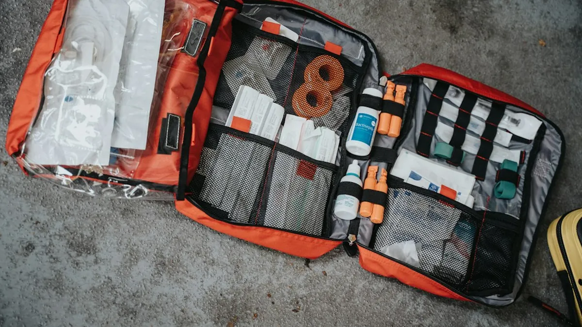 Comprehensive first aid kit with bandages, antiseptic, and pain relievers