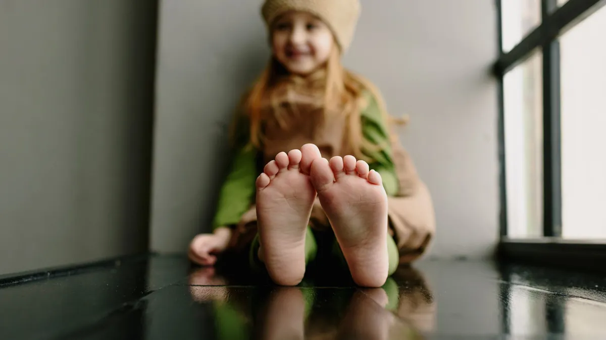 Failing to Wear Appropriate Footwear for Stone Floors and Stairs