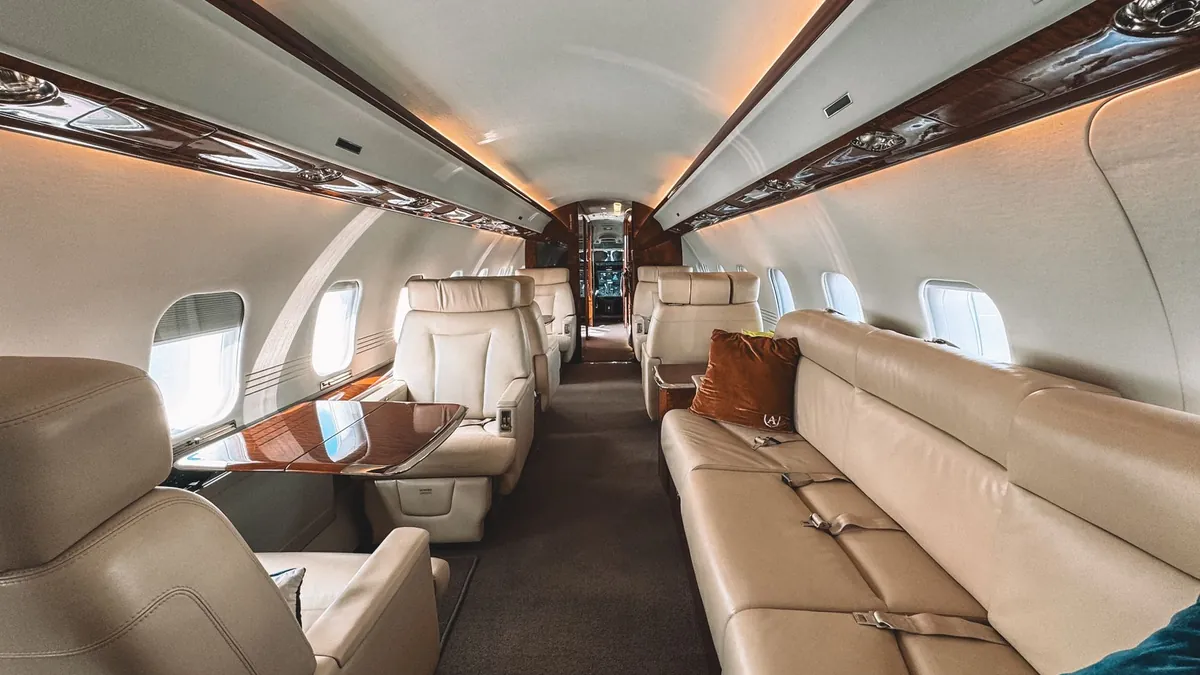 How Airlines Decide Passenger Upgrades When Overbooked