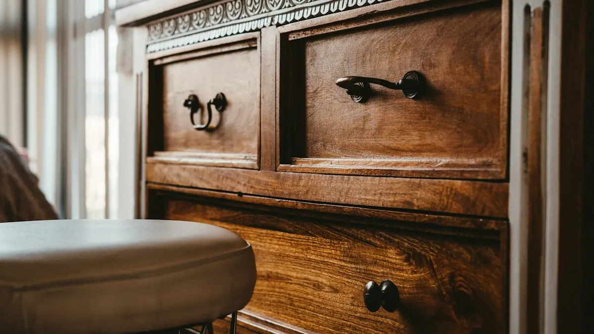 Inspect under beds, behind dressers, and inside furniture crevices where small belongings commonly get misplaced