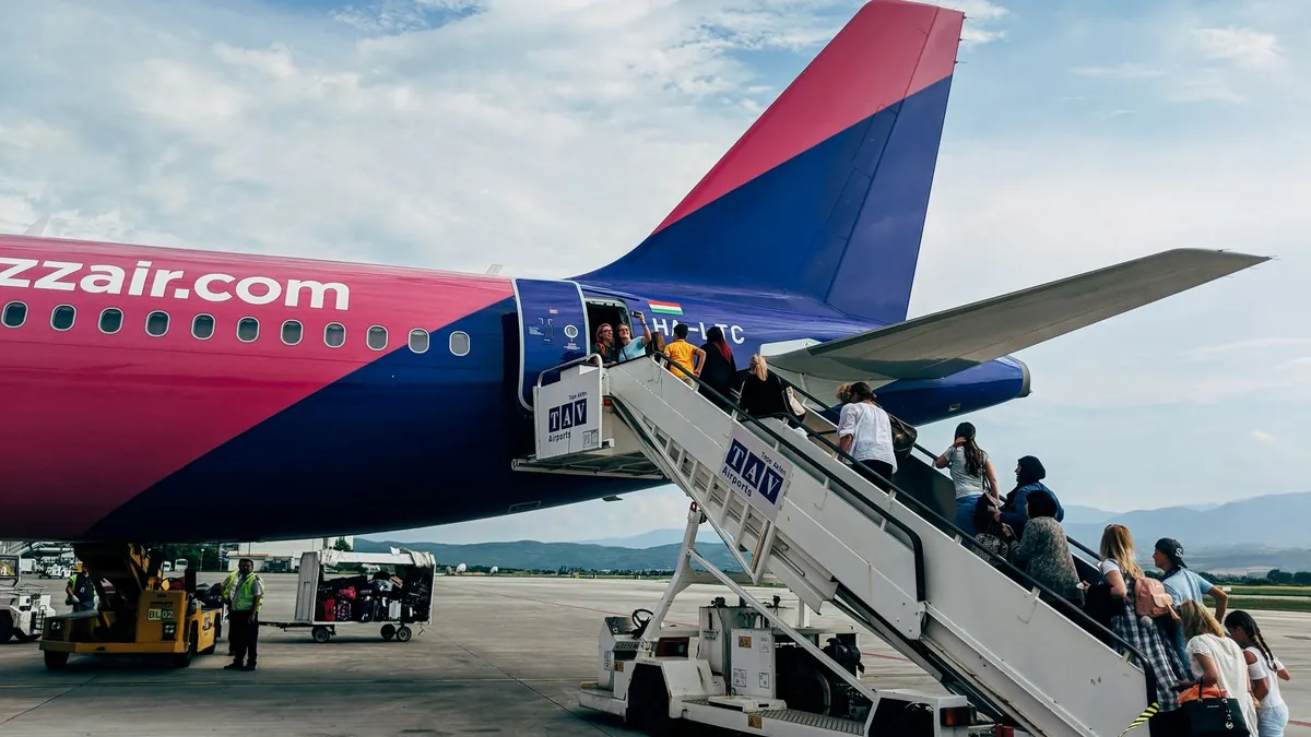 Leverage Premium Cabin Status for Priority Boarding and Bin Access