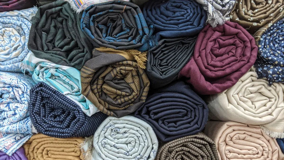 Master the Art of Rolling Clothes Instead of Folding to Maximize Carry