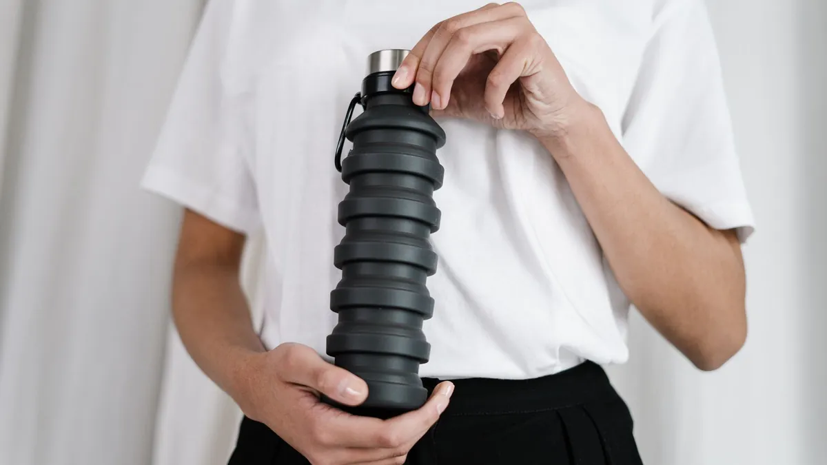 Reusable water bottle with collapsible design
