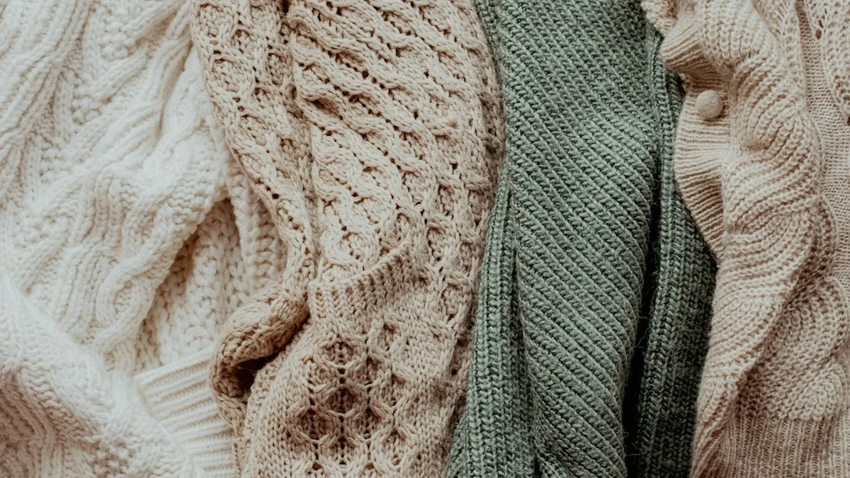 Stack Bulky Sweaters Alternately with Thinner Layers to Optimize Vertical Packing Efficiency