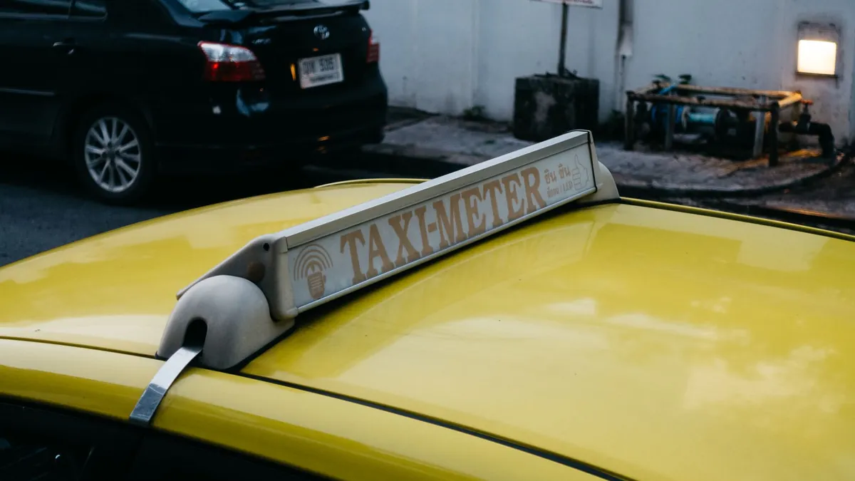Taxi and Rideshare Overcharging Schemes