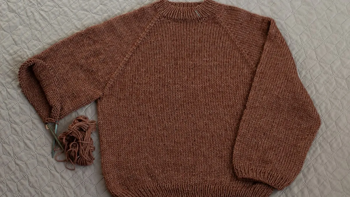 Wear Your Bulkiest Sweater During Travel to Eliminate Luggage Weight